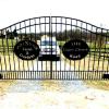 A Gate design option  may include   a custom plasma cut logo or design in a medallion that is incorporated into the driveway gate.