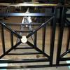 wrought iron handrail with brass rail cap and brass rosettes