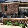 Custom Iron Fencing around Wall