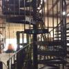 Building Progress on Spiral Staircase